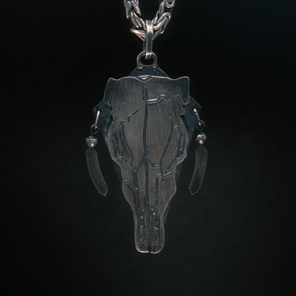 Cow skull pendant